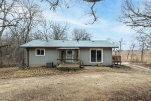 Wooded Country Home and 6 M/L Acres on Paved Road photo