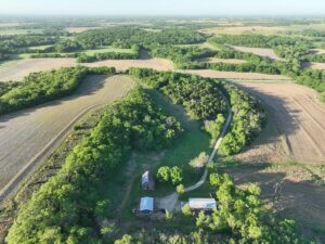 Country Home on 57 M/L Acres – Privacy, Space & Tillable Income photo