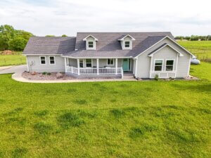 Experience the Perfect Blend of Modern Comfort, Efficiency, and Rural Versatility on this Exceptional 35± Acre Homestead! photo